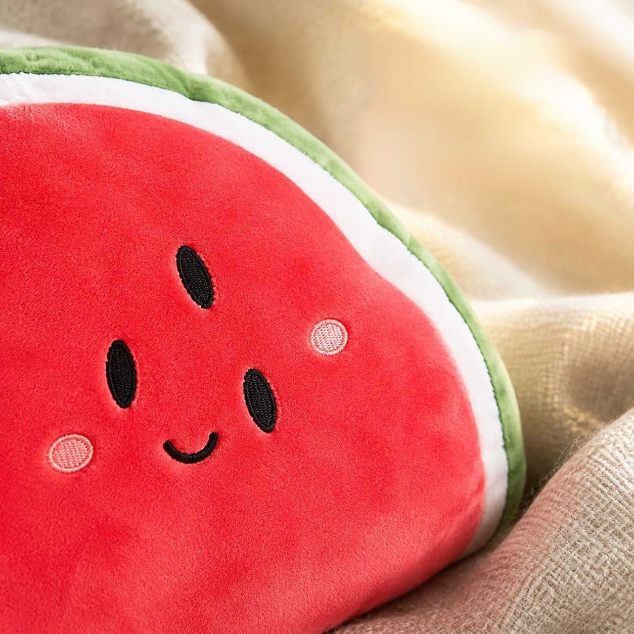 Watermelon plush toy pillow for cozy lounging and relaxation