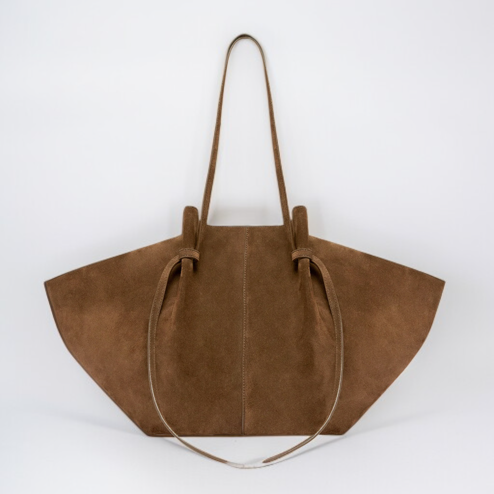 حقيبة يد كبيرة الحجم من الجلد الصناعي، تُحمل على الكتف أو تحت الإبط