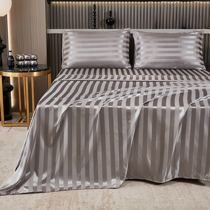 Three piece set of silk satin bed sheets