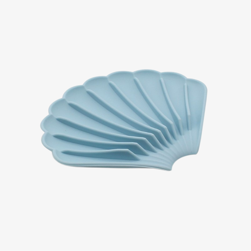 Jabonera de goma blanda con forma de concha y drenaje