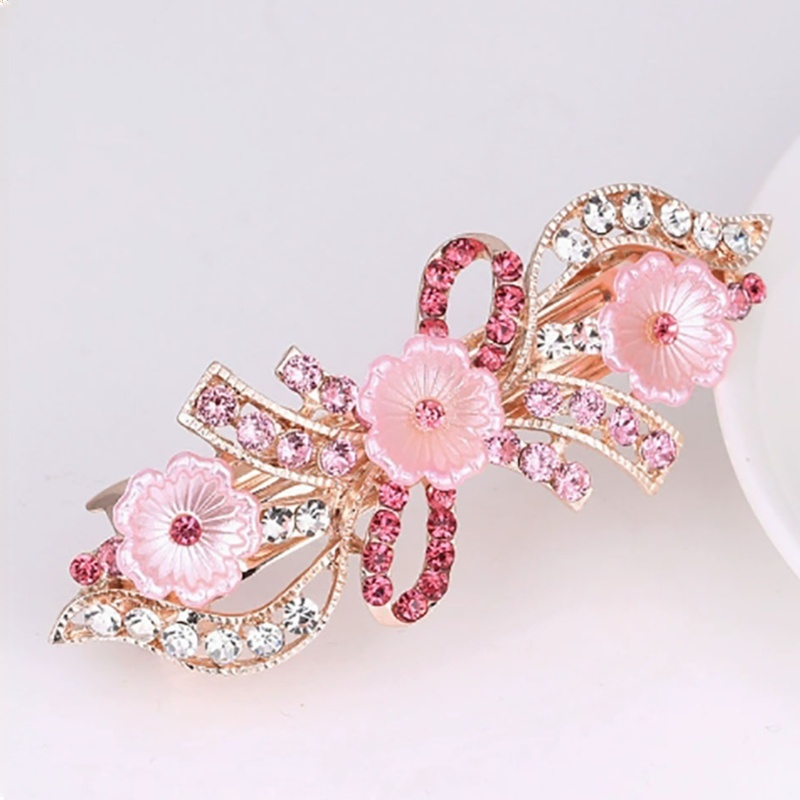 Duża spinka do włosów w kształcie kokardy