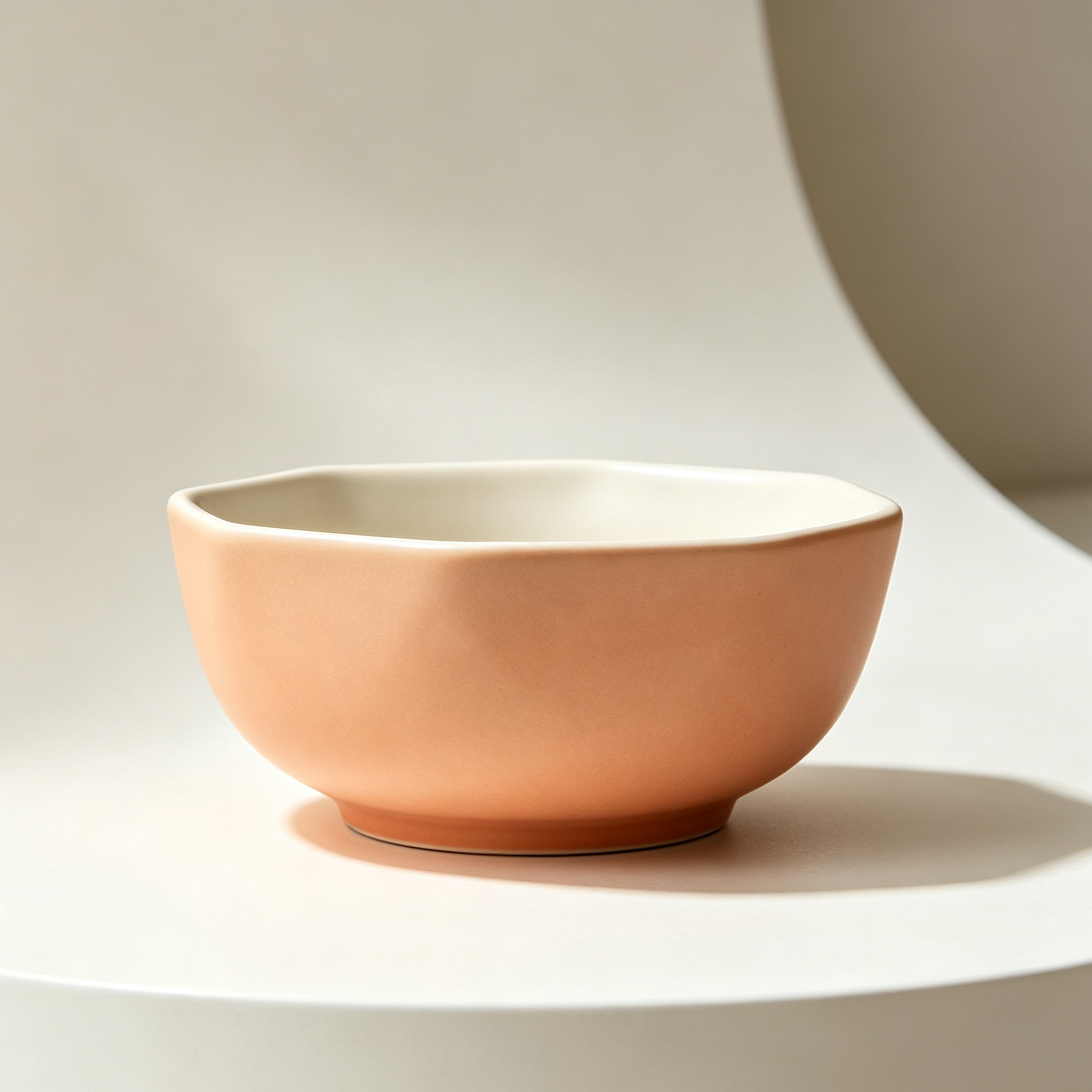Set of 6 polygonal ceramic bowls arranged on a dining table