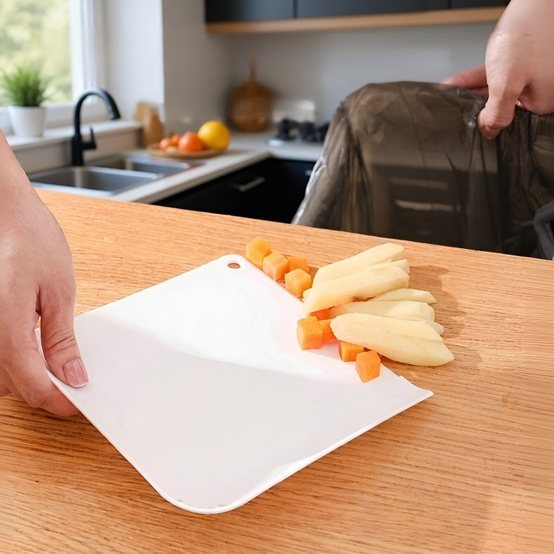 Hangable cutting board with drainage holes
