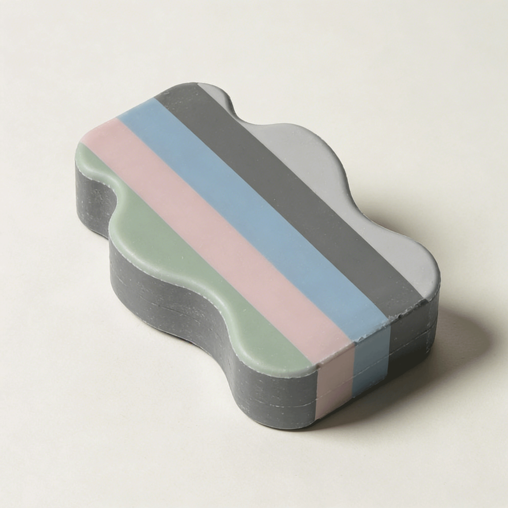 Colorful striped soap bars arranged in a row