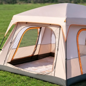 Family enjoying time inside the outdoor two-room camping tent