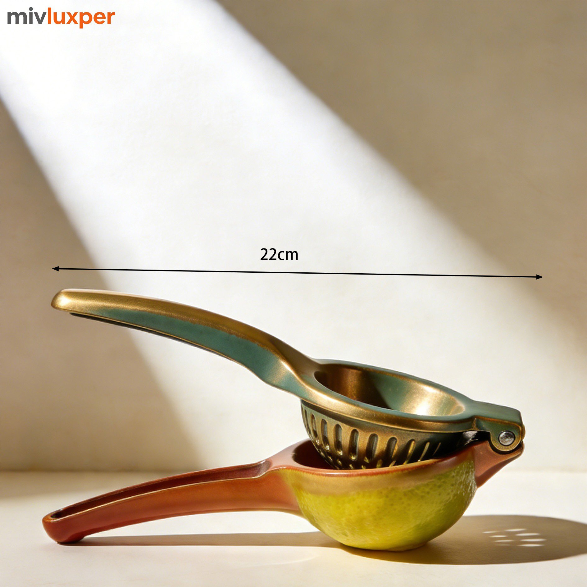 Exprimidor manual con mango ergonómico