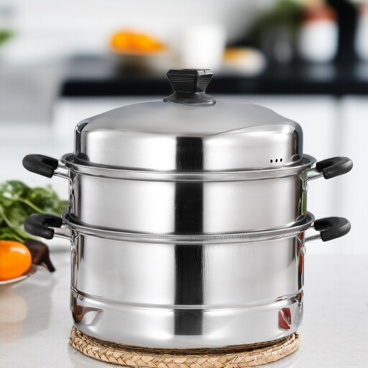 Three-layer stainless steel steamer pot on kitchen counter