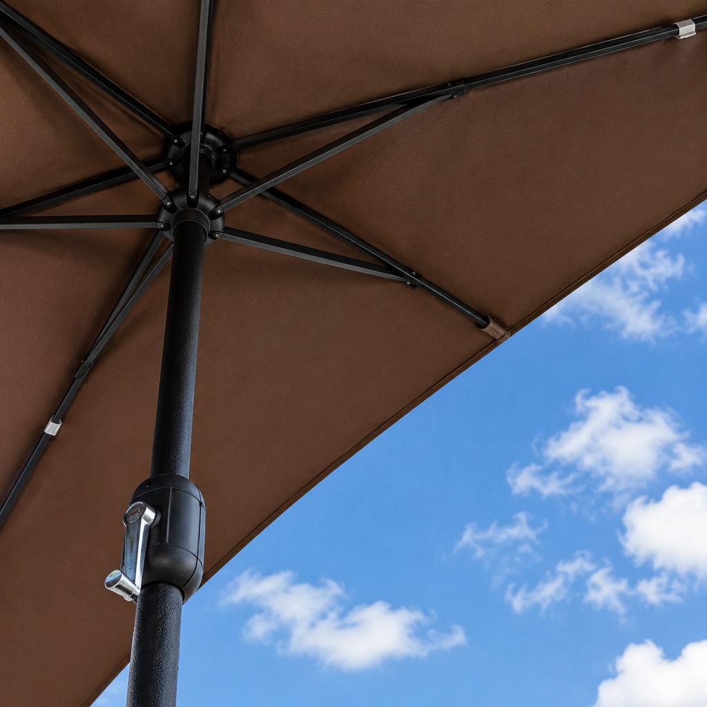 Space-saving half umbrella shading a balcony seating area