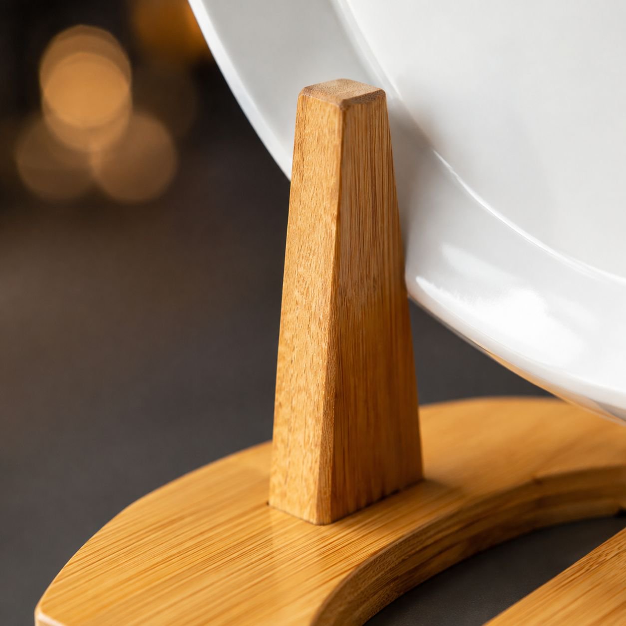 Close-up of bamboo plate display stand