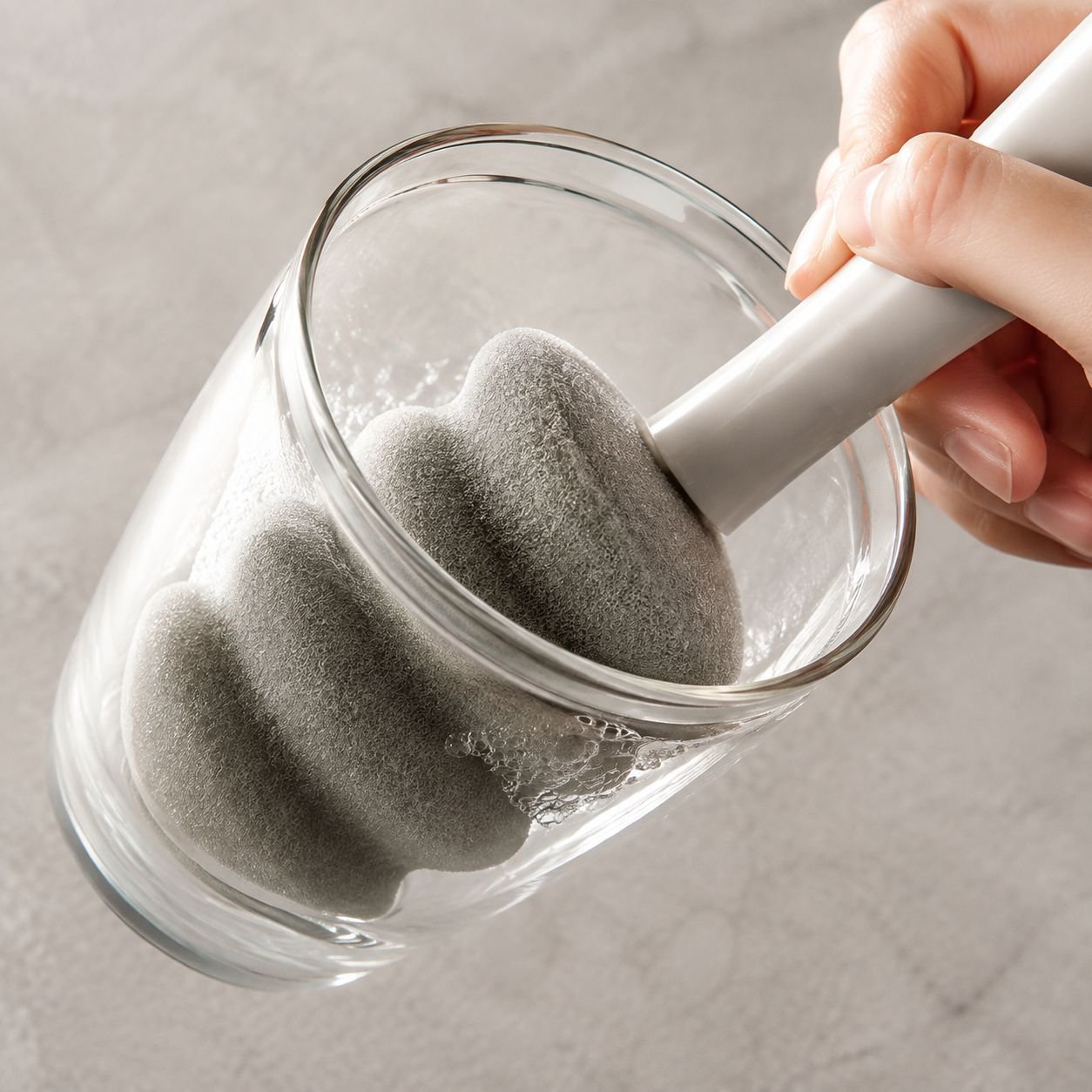 Cup brush artifact showing 3-in-1 multifunctional design