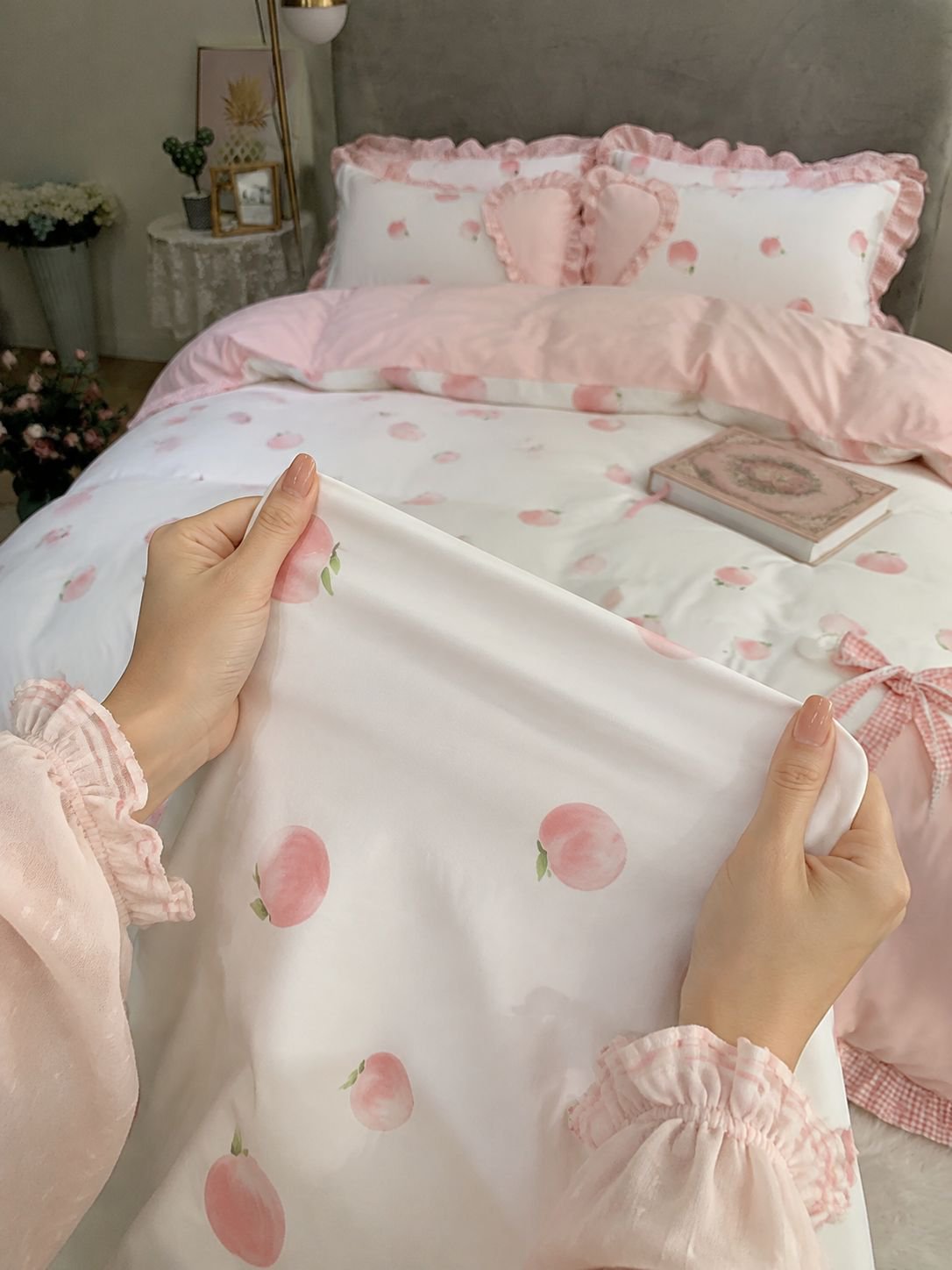 Luxury pink bedding set with ruffled lace accents