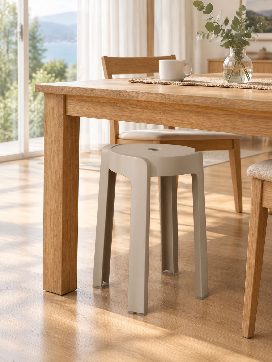 Stackable plastic dining stool with a space-saving design