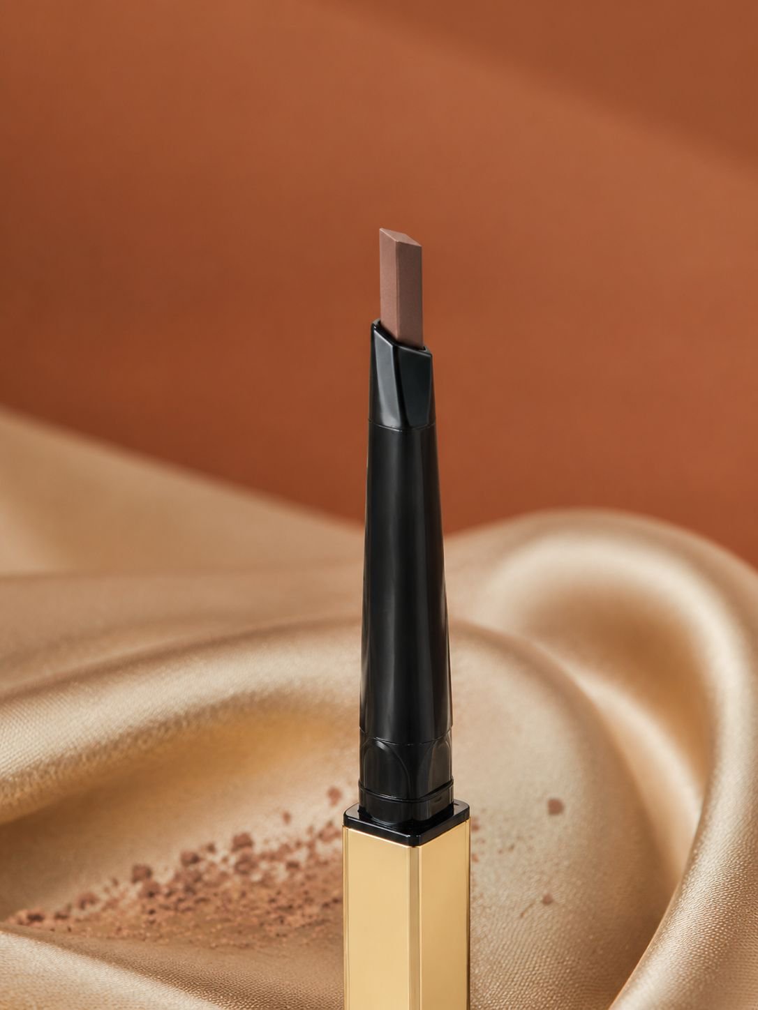 Close-up of JMY Gold Bar Eyebrow Pencil tip for precise application