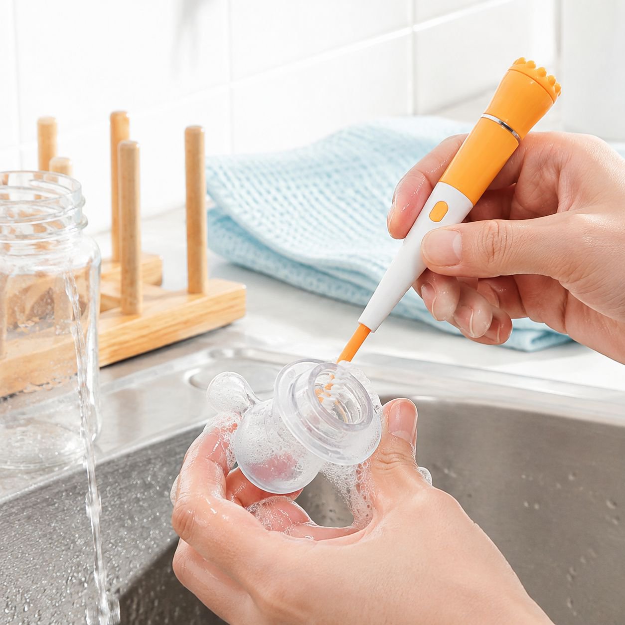 Cup brush with detachable brush heads
