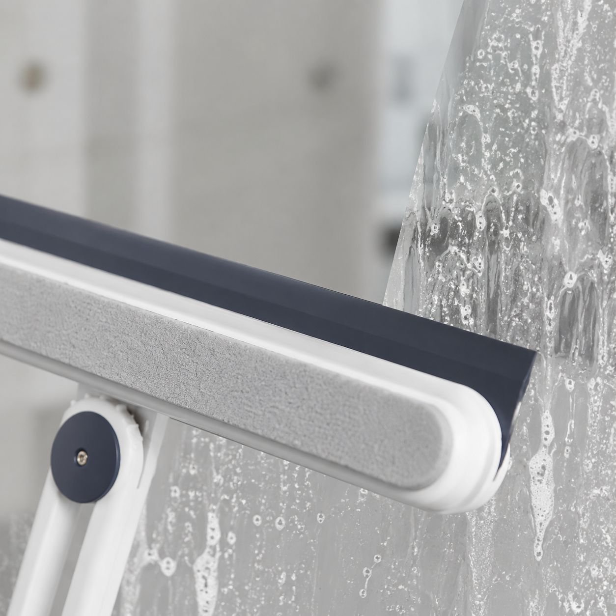 Double-sided cleaner for shower glass doors