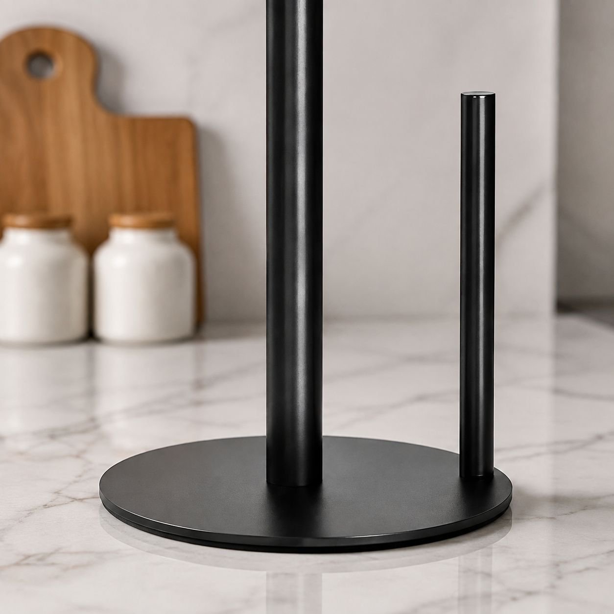 Desktop stainless steel paper towel holder on kitchen counter