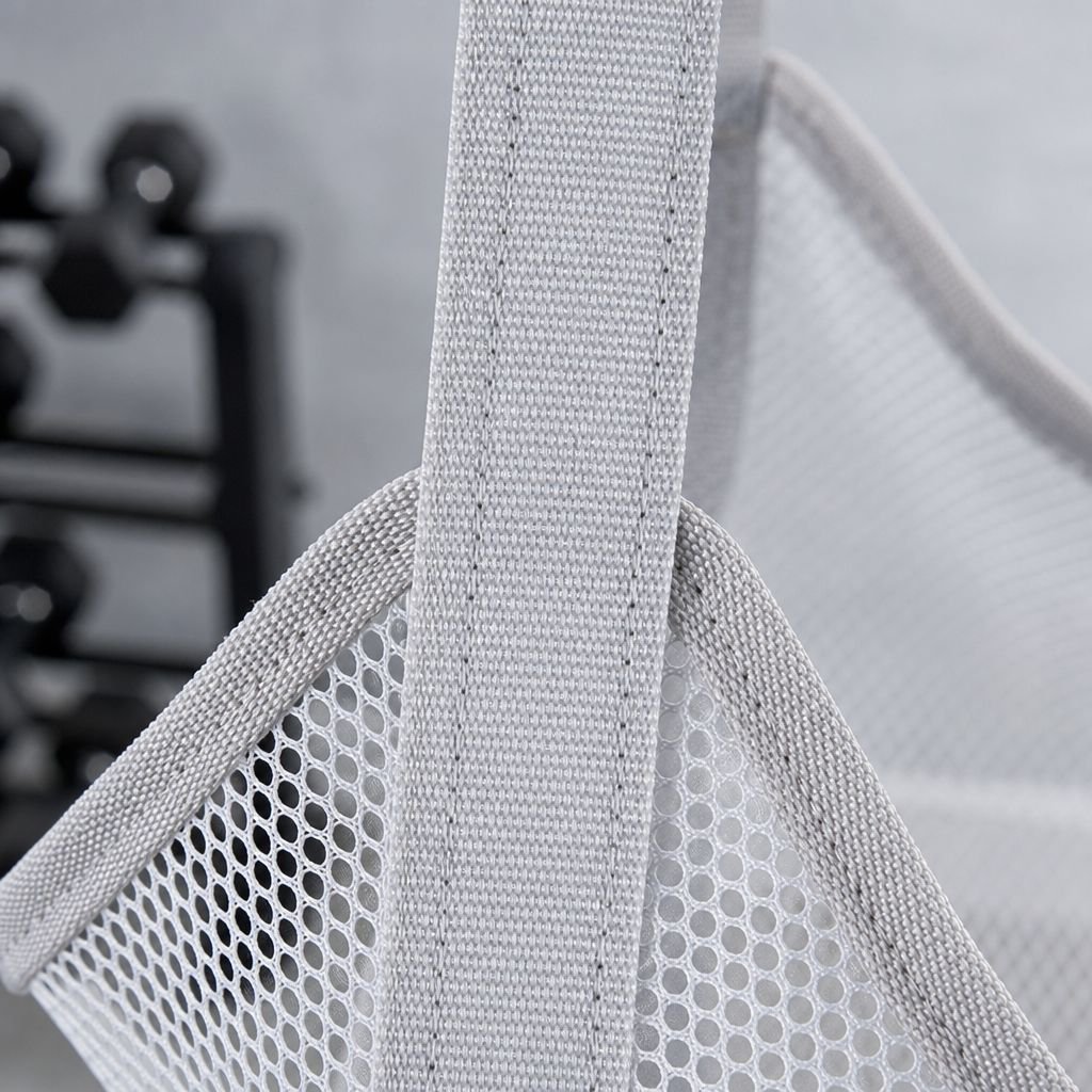 Sports ball storage bag hanging on a door