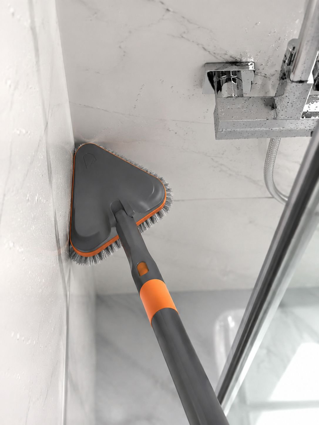 Long handle brush reaching under furniture