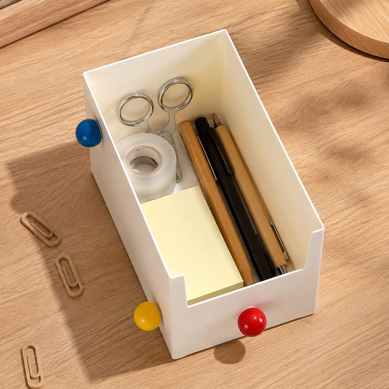 Close-up of dopamine color stationery organizer compartments