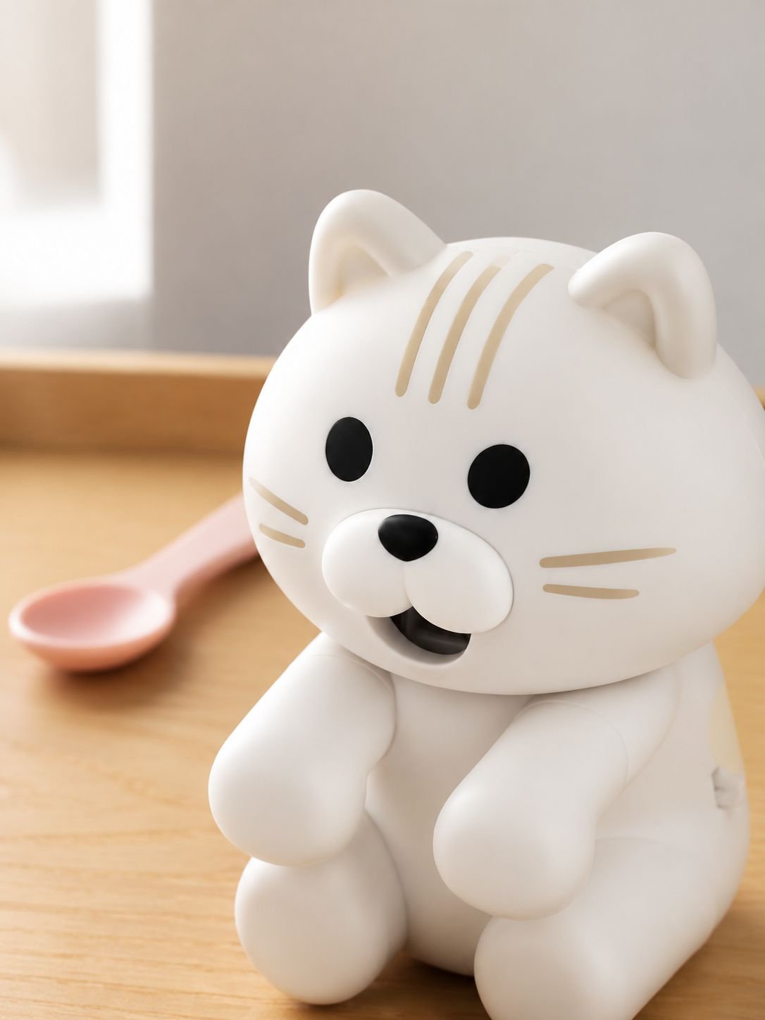 Cat food cooling accessory shown next to a feeding bowl
