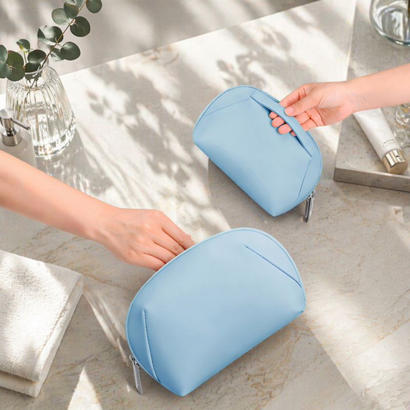 Portable protective case for PC accessories on travel desk