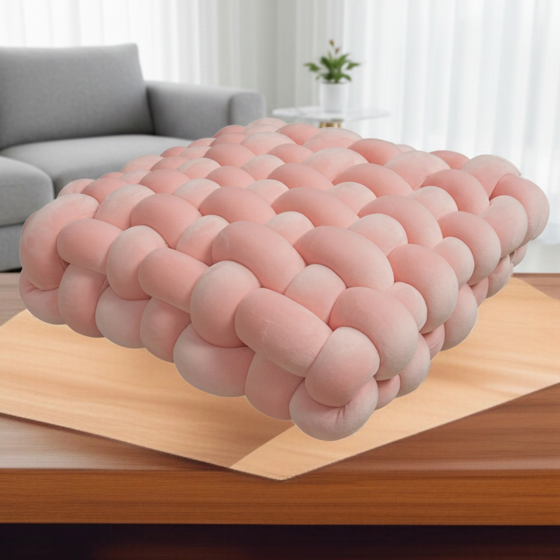 Modern home accent with woven knot cushion