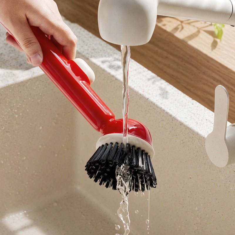 Easy refill liquid compartment on the dish brush