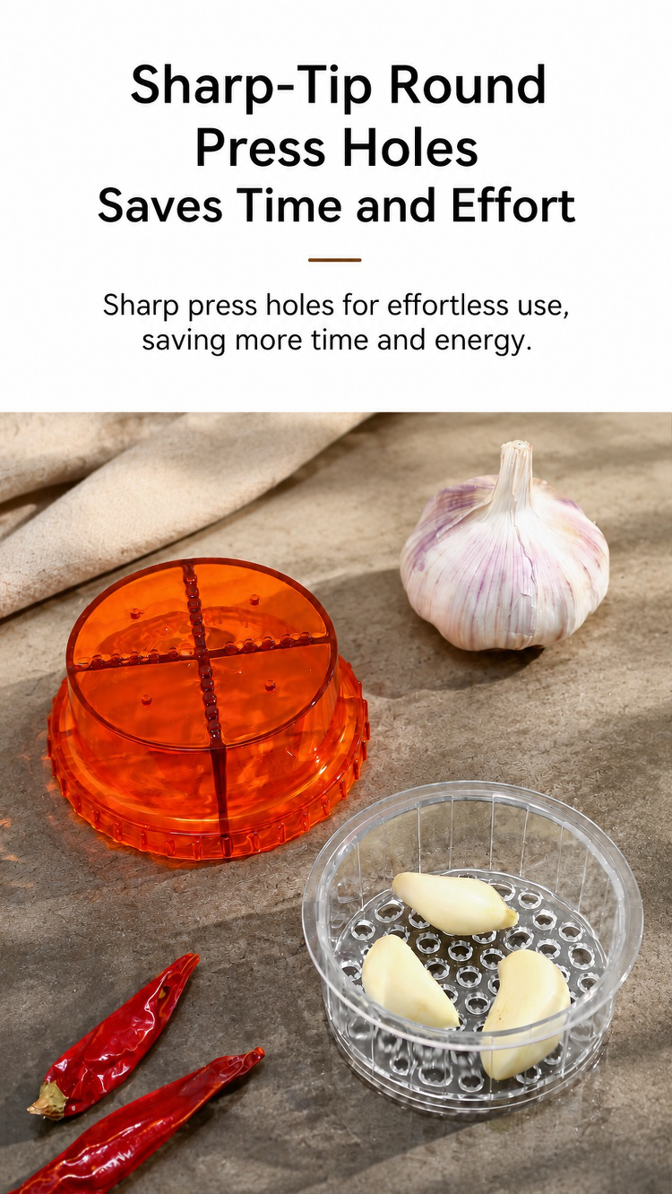Close-up of garlic press extracting garlic paste
