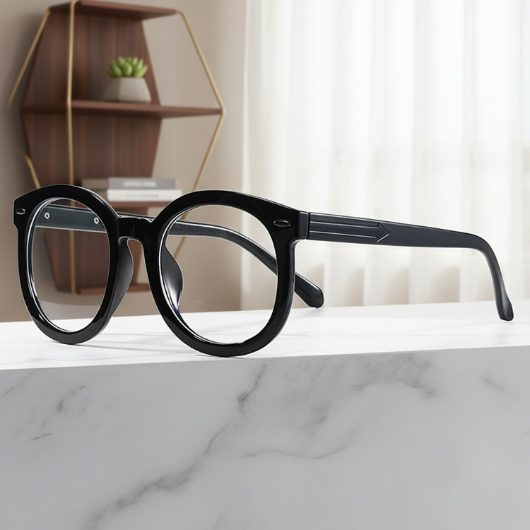Monture de lunettes noire minimaliste pour femme au visage rond
