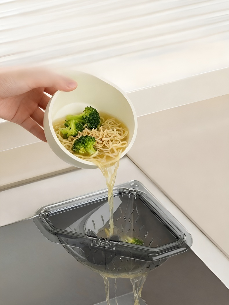 Cesta de drenaje magnética atrapando residuos en fregadero