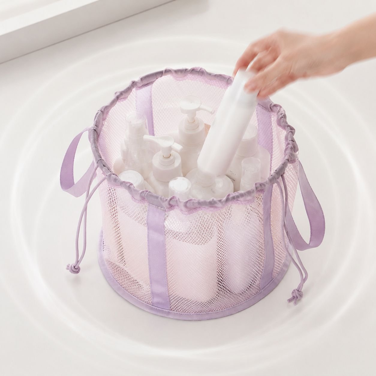 Foldable shower bag hanging in bathroom