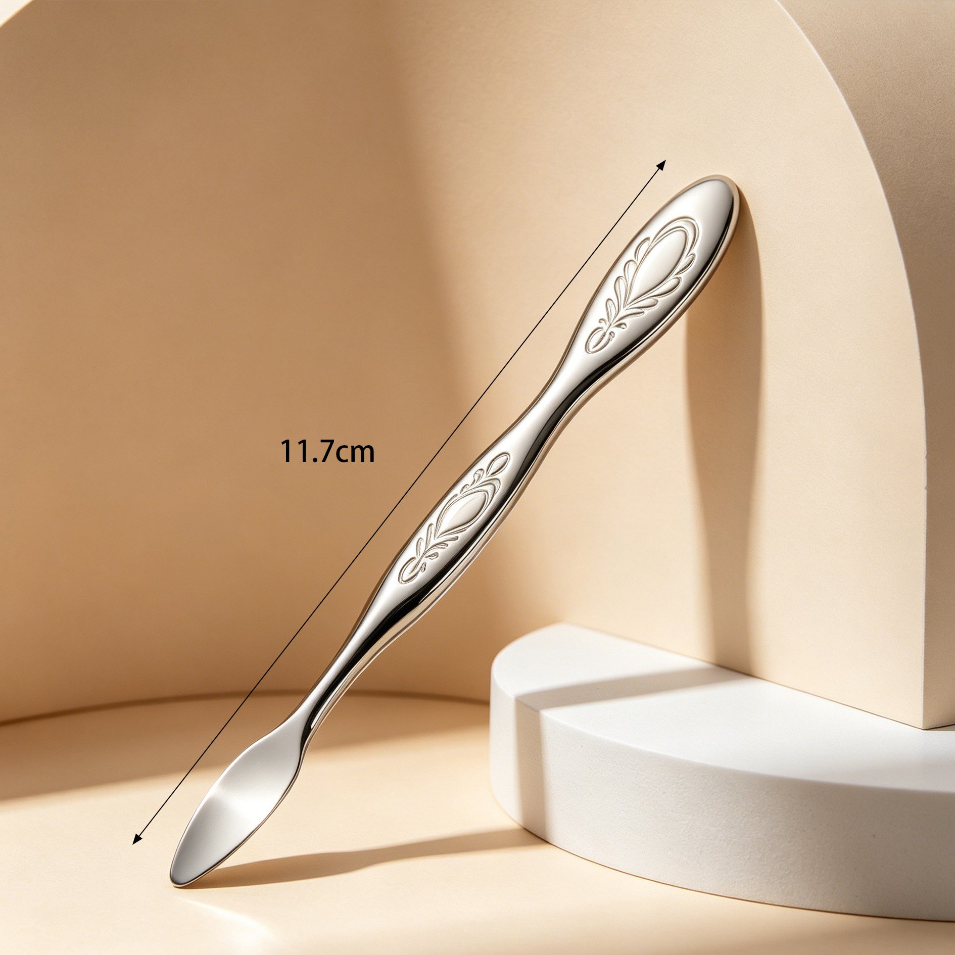 Ergonomic stainless steel spatula for manicures