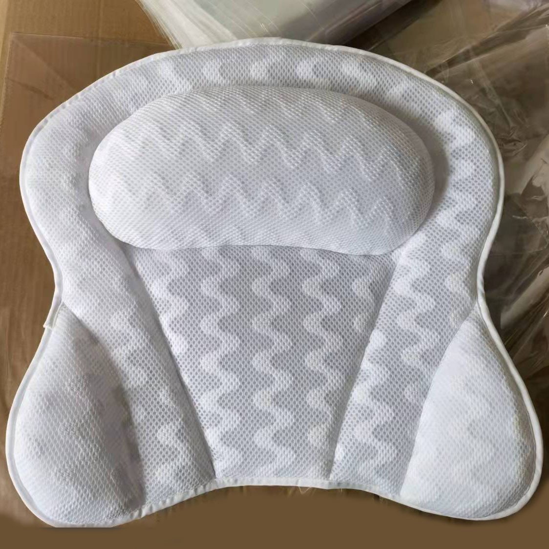 Quick-drying bath pillow with hooks