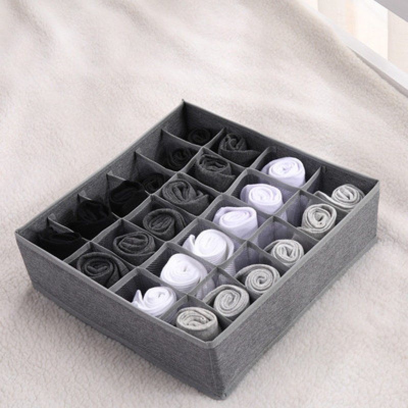 Caja de almacenamiento con divisor de tela