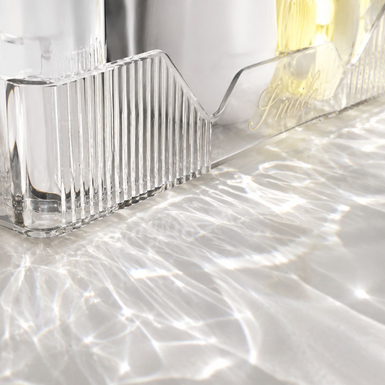 Space saving under sink storage rack