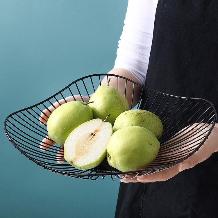 Plato de fruta de hierro forjado con hojas de loto