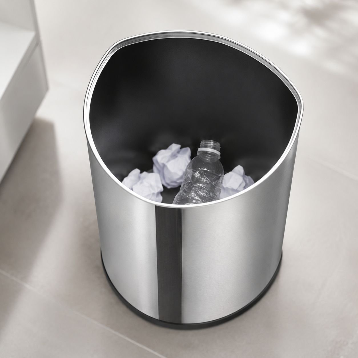 Organizing cleaning supplies with heavy-duty trash bag bin