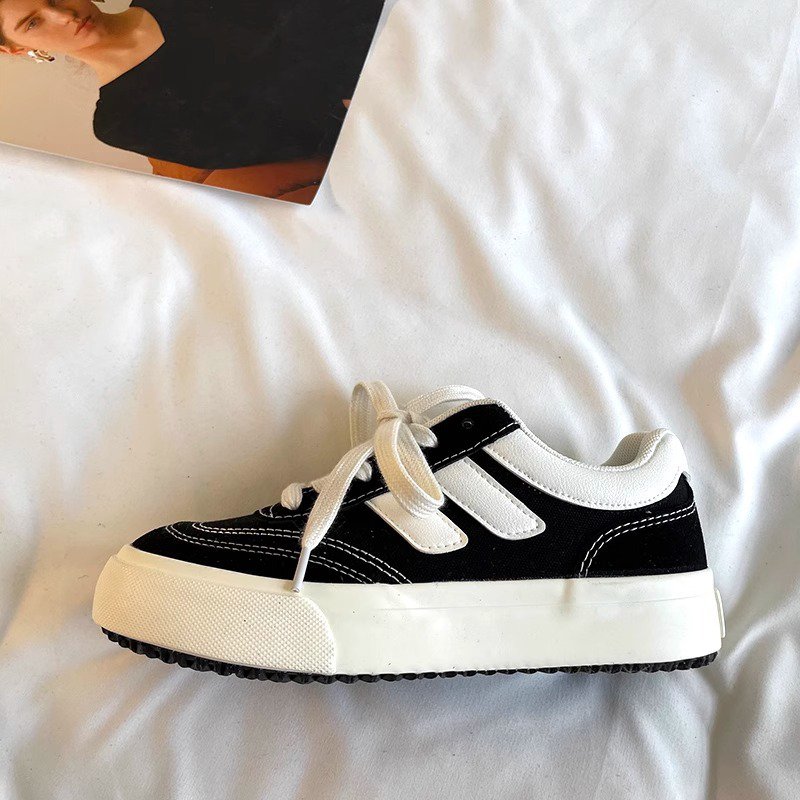 レトロな香港スタイルの黒キャンバスレディースシューズ正面画像