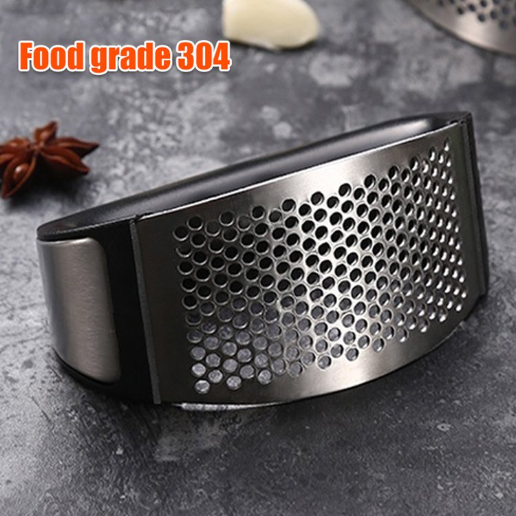 Hand-Held Garlic Press