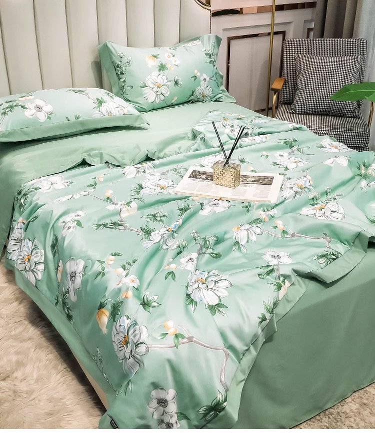 軽量で扱いやすい肌掛け布団を持つ手元